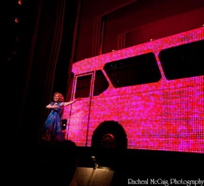 Tony Sheldon ("Bernadette") gets ready to tour the bus Photo